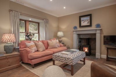 Cosy up beside the wood-burning fire