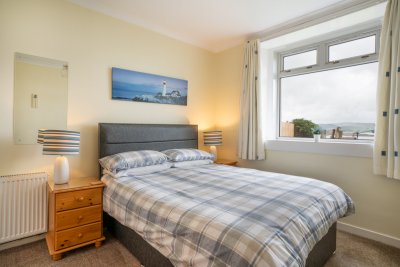 The second double bedroom also enjoys superb sea views
