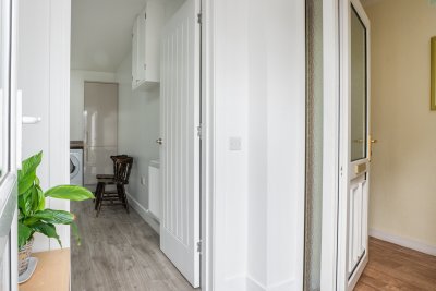 Entering the cottage via a spacious porch and hallway