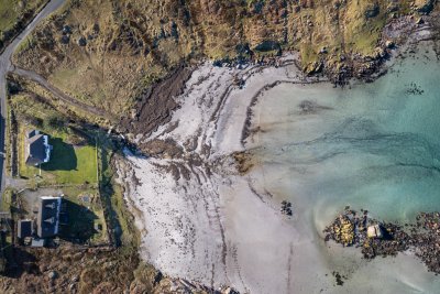 A bird's eye view of Tigh na Failte and the stunning shell-sand beach