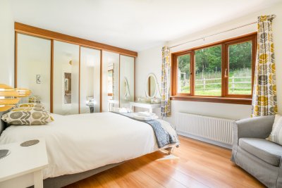 The master bedroom feels like a peaceful oasis and is beautifully presented