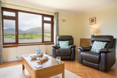 Enjoy a nightcap at dusk as the loch fills with visiting wildlife and the deer descend from the hills