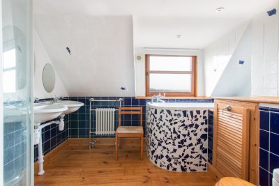 Enjoy a soak with a view from this striking bath tub