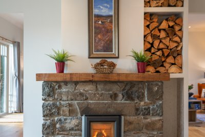 The feature twin fireplaces add oodles of character to this stunning home