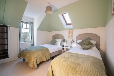 The cosy twin bedroom at Torrbreac, served by an en-suite 'Jack and Jill' style bathroom
