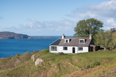 Tostary Cottage's superb setting on the west coast hillside