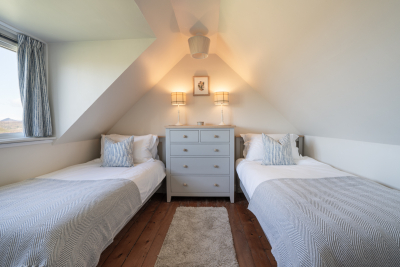The compact twin bedroom, also with combed ceiling