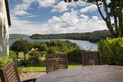 Outdoor seating area with harbour views