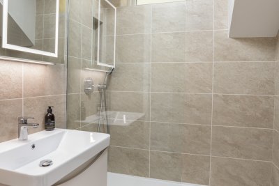 The family bathroom with large walk-in shower
