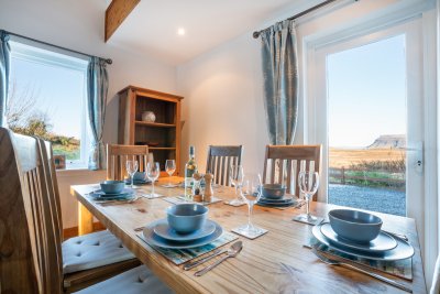 Dining table with lots of light and views