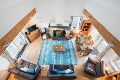 The open plan living area with high ceilings