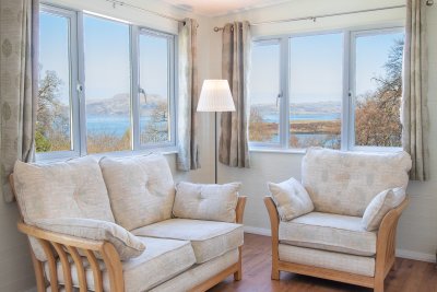 Soak up the sea views from the comfy sun room
