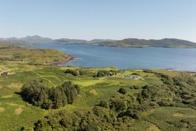A bird's eye view of the access track leading to Kilninian Cottage, hidden by the trees