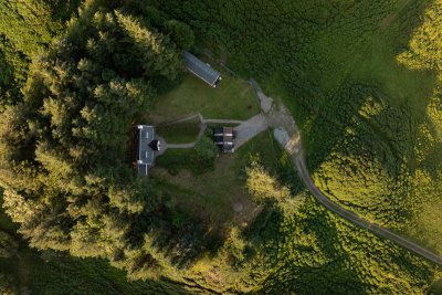 Looking down on Kilninian Cottage, showing also the owner's static caravan adjacent 