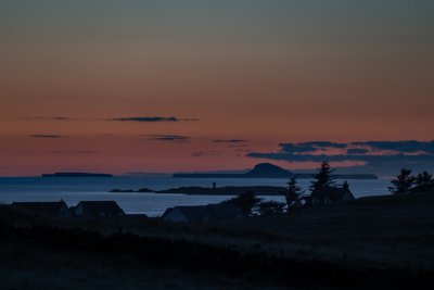 Sunset view from the house to the distinctive island Bac Mor, aka The Dutchman's Cap