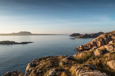 Sit by the unspoilt coastline and watch for passing wildlife