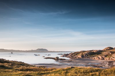 Looking across the beach at Fionnphort at sunset