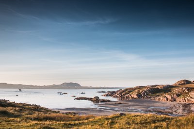 Looking across the beach at Fionnphort at sunset