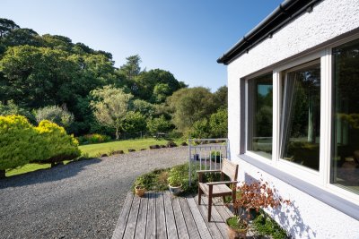Surrounded by woodland and hills