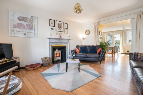 Lovely light-filled living area with characterful features