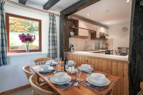 Peeking from the dining table through to the kitchen