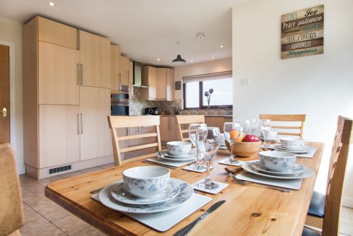 Dining table in the open plan kitchen and dining area