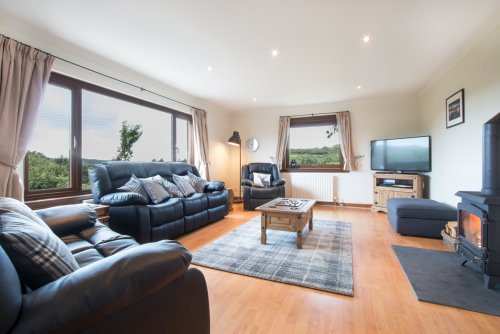 Great sitting room with large windows