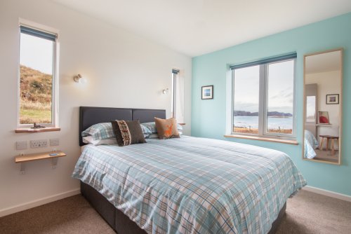 Wake up to stunning sea views from the queen-sized bed