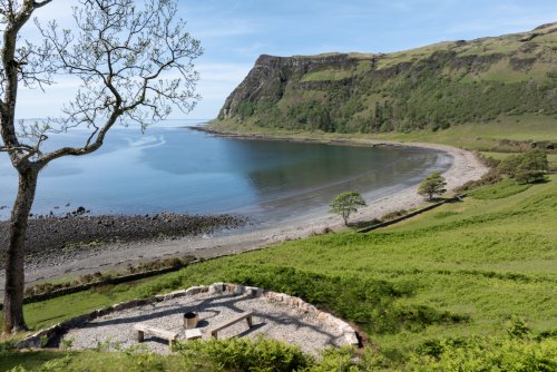 Wander down to the sweeping bay from the house