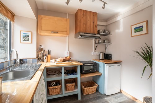 The compact yet well-equipped kitchen