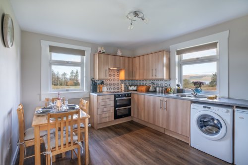 Wash up with a sea view from the well-equipped kitchen