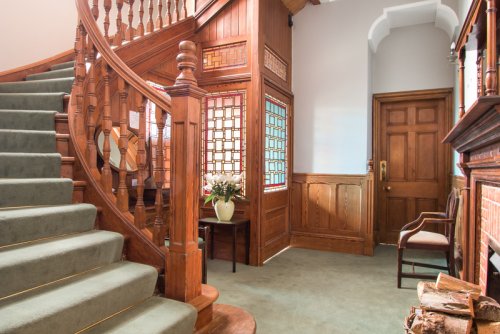 Sweeping staircase at Craig Ben Lodge