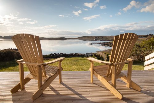 Decking with a view in front of the property, accessed from the living area