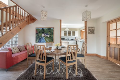 The dining area at the Coach House flows off the kitchen
