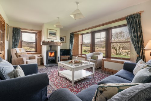 A lovely setting to come together around the wood-burning stove