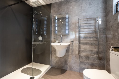 Impeccably appointed bathrooms and spotlessly clean throughout