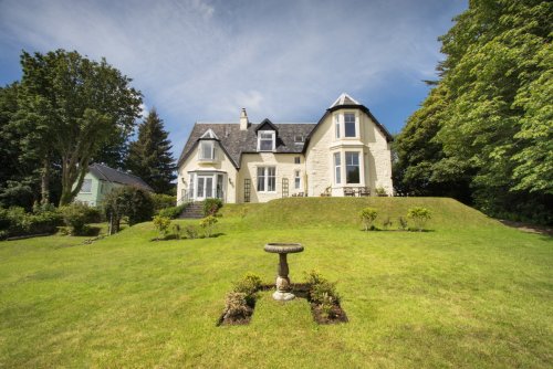 Ulva House sits in extensive, well maintained grounds.  Columba Apartment situated on the ground floor (left)