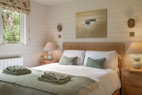 The serene master bedroom at Coorie Doon