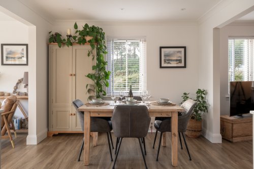 The beautiful dining area flows off the kitchen