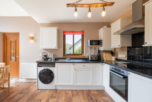 The open plan kitchen flows effortlessly onto the dining area, a great space for entertaining