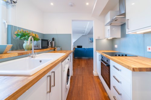 Looking from the kitchen toward the living space