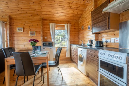 Eas Lodge open plan living area with kitchen and dining area