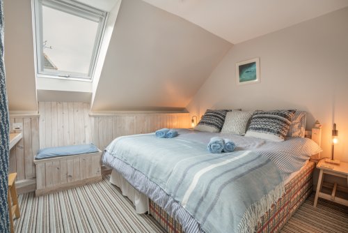 Enjoy a great night's sleep in the super-king-sized bed