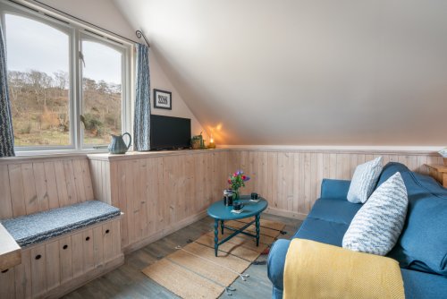 The living area is bathed in natural light