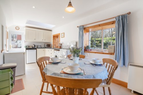 Bright and charming kitchen diner at Hazelbank Cottage