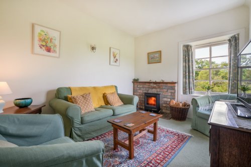 A traditionally styled living room for this stone cottage