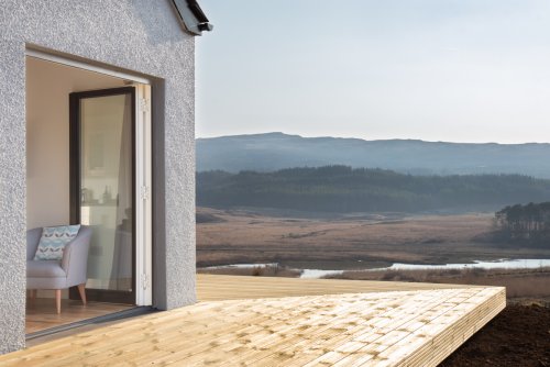 Decking leading out from living area to fabulous views 