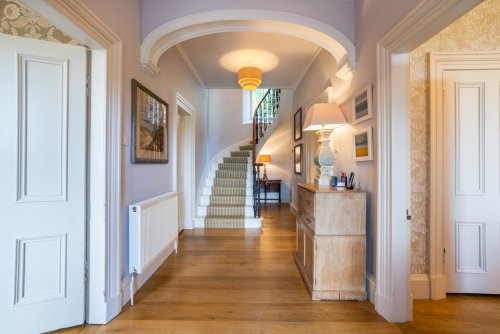 Period features fill the property with Highland charm and grandeur