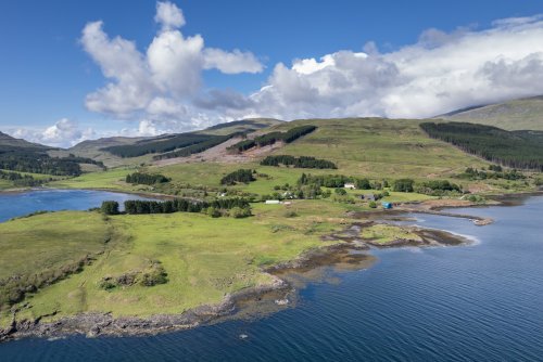 Kilfinichen House enjoys an impressive location set back above Kilfinichen Bay and Loch Scridain