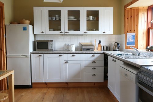 Fitted kitchen and separate utility room